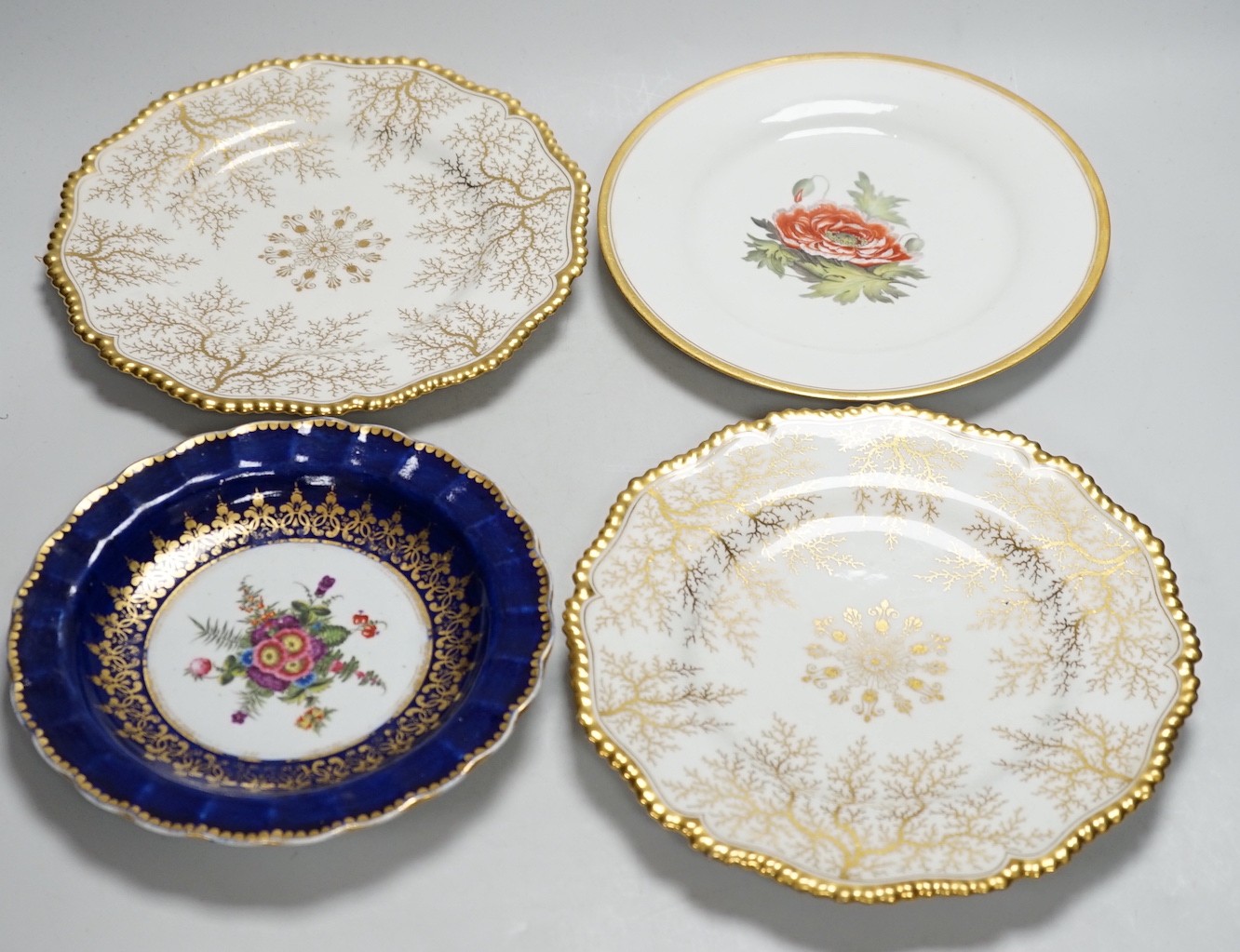 A Chamberlain's Worcester floral plate, and three Barr Flight & Barr plates, largest 22.5 cm
